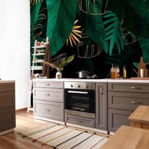 Fotobehang - Jungle and composition - motif of green and golden leaves on a black background