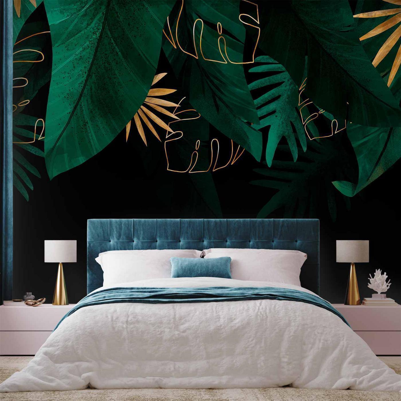 Fotobehang - Jungle and composition - motif of green and golden leaves on a black background