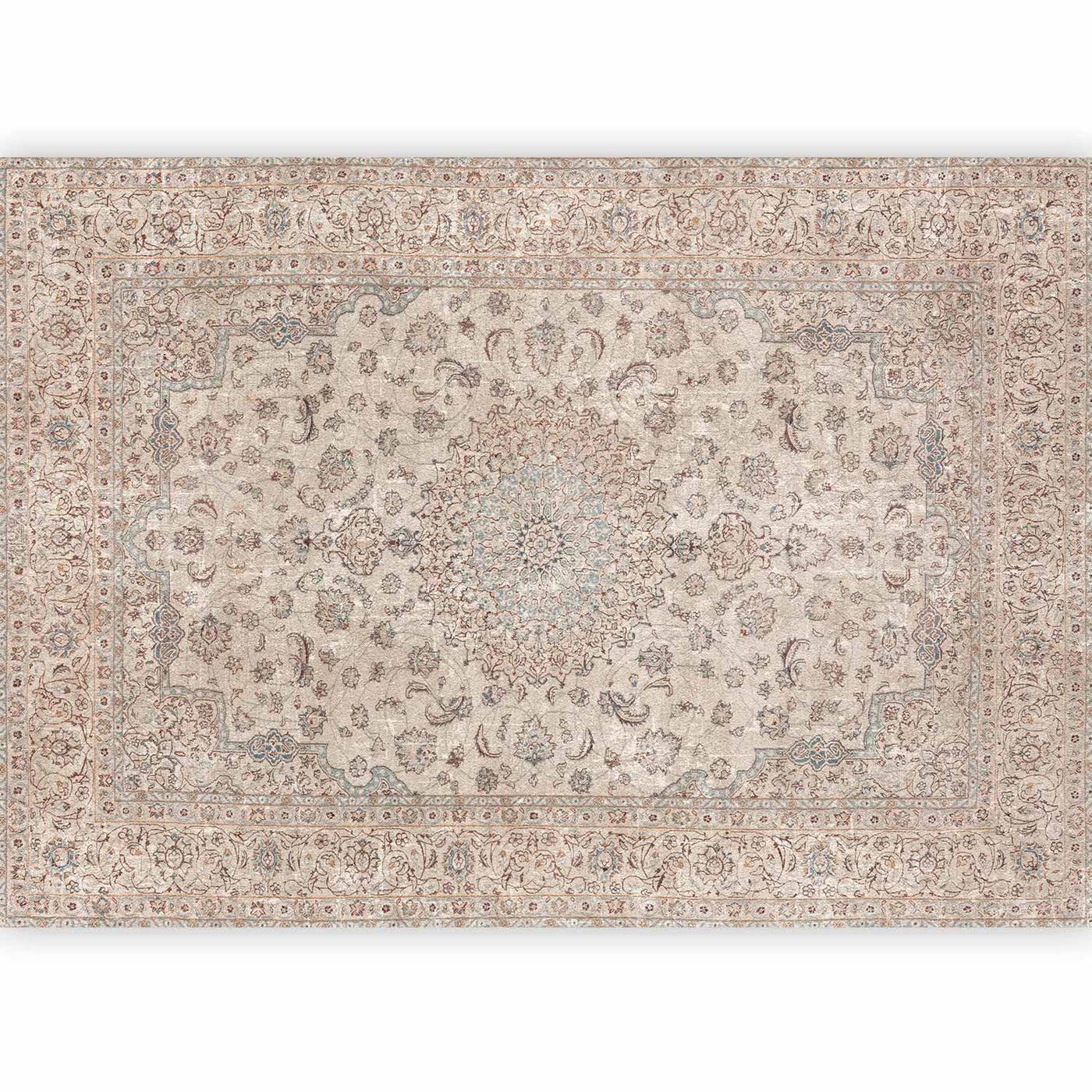 Fotobehang - Sand carpet - worn Persian carpet with rich decorative motifs