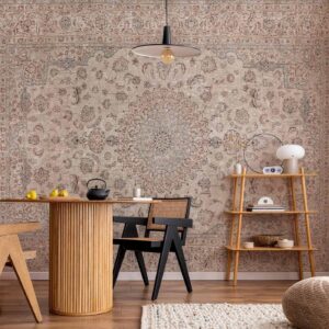 Fotobehang - Sand carpet - worn Persian carpet with rich decorative motifs