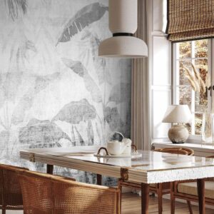 Fotobehang - Vanishing jungle - landscape of exotic trees and leaves in grey tones