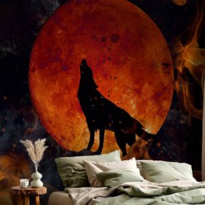 Fotobehang - Wild nature - wolf on a background of a red moon in flames of fire